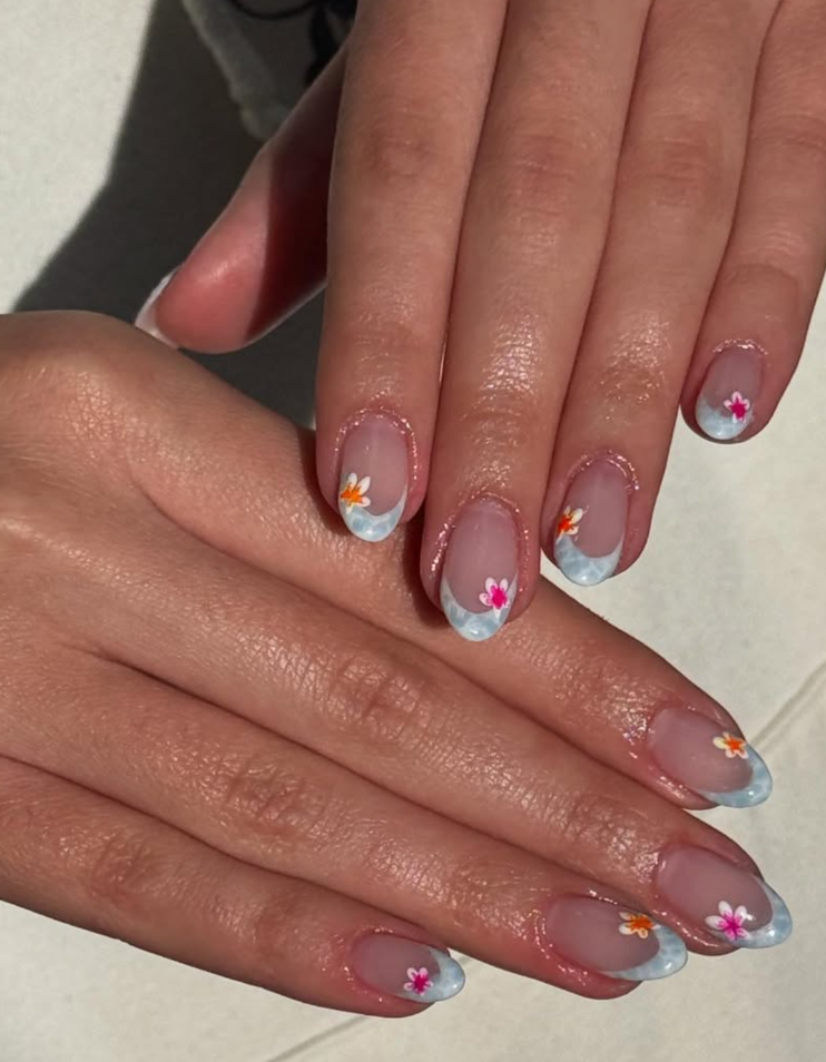 Gel-X French azul con flores pintadas a mano — nail extensions Cape Coral Florida